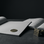 Court document, registry ledger and unused registration stamp symbolizing the gap between a court decision and registry update