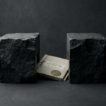 Property registry file trapped between two stone blocks symbolizing the institutional gap between enforcement closure and registry clearance.